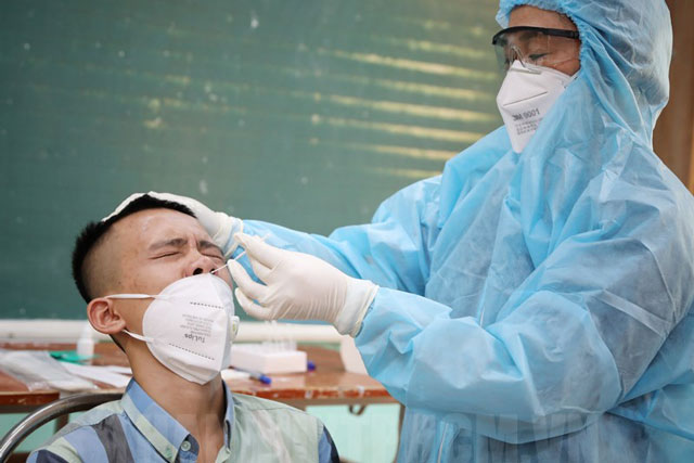 Sáng 26/2: Số ca mắc mới COVID-19 trung bình tuần qua là 57.160 ca/ngày