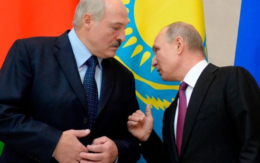 Tổng thống Putin (phải).