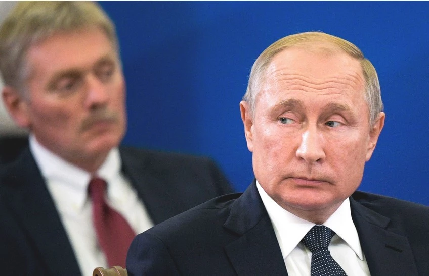 Tổng thống Nga Putin (phải).
