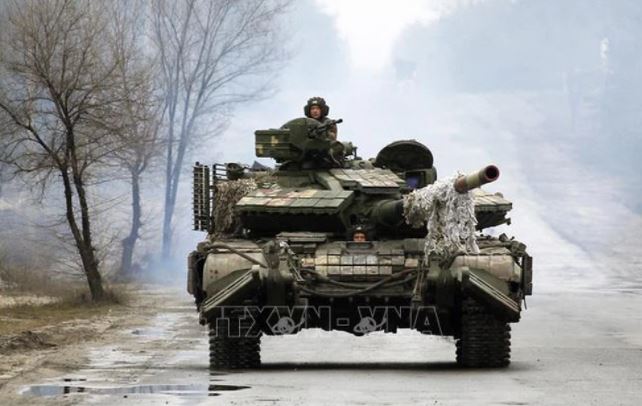 Quân nhân Ukraine trong cuộc xung đột với lực lượng Nga ở vùng Lugansk, ngày 25/2/2022. Ảnh: AFP/TTXVN
