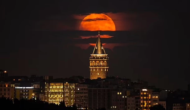 A supermoon rose behind the Galata Tower in Istanbul, Turkey on the evening of June 14 2022