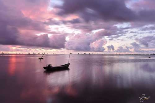 Bãi biển hoang sơ ở Thái Bình với những chòi canh ngao ẩn hiện đầy thơ mộng