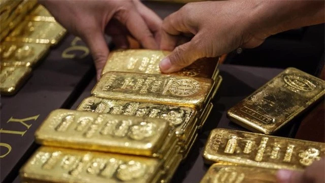 Giá USD lập đỉnh, thị trường vàng biến động trái chiều - Ảnh 1.