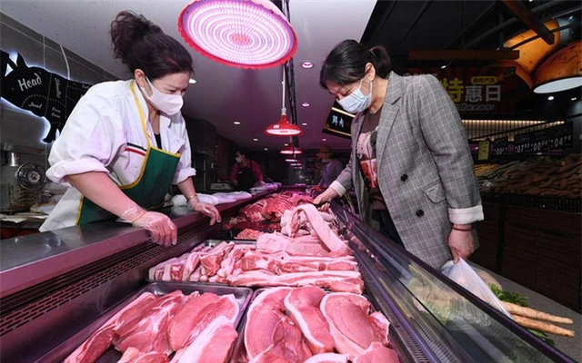 Trung Quốc xả kho dự trữ thịt lợn - Ảnh 1.