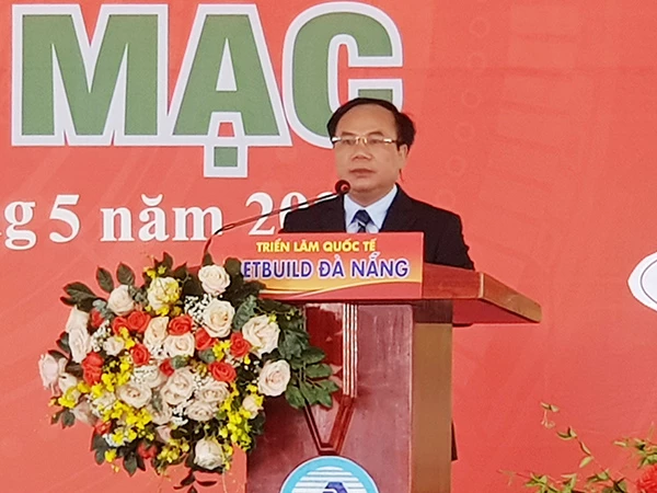 Deputy Minister of Construction Nguyen Van Sinh speaking at the opening of the international exhibition VIETBUILD Da Nang 2023