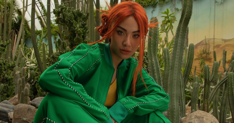 Á hậu Kim Duyên diện đồ thể thao, khoe tóc cam cháy cuốn hút