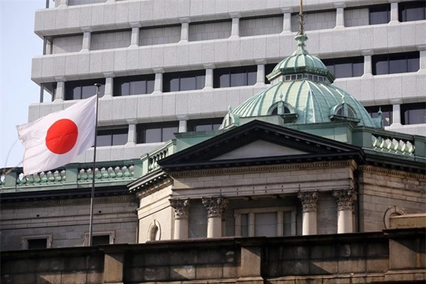 Nhật Bản điều chỉnh giảm tăng trưởng - Ảnh 1.