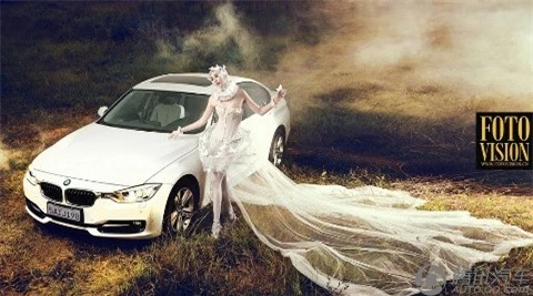 Kiều nữ trắng muốt bên BMW ảnh 1