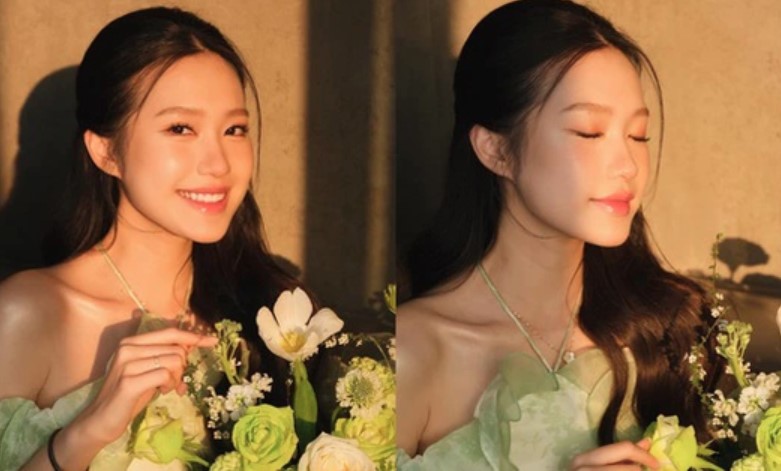 Doãn Hải Mỹ khoe nhan sắc ngọt ngọt, lộ xương quai xanh quyến rũ khi tạo dáng bên hoa