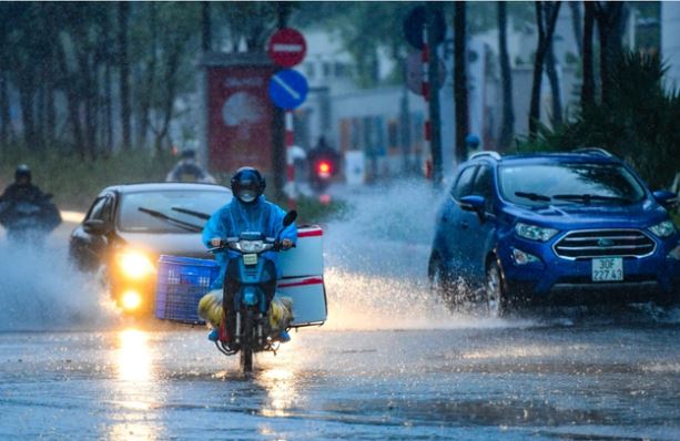 Không khí lạnh gây mưa rào ở miền Bắc, trời chuyển rét