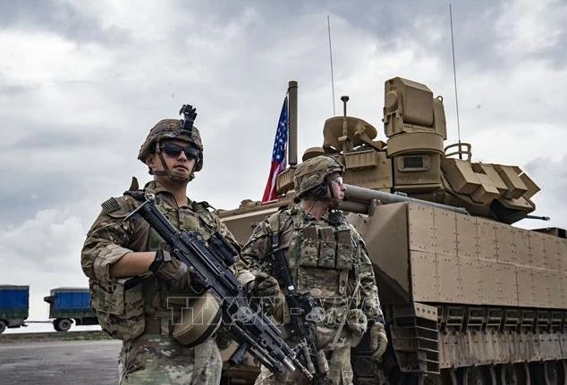 Binh sĩ Mỹ gác tại tỉnh Hasakeh, Syria. Ảnh tư liệu: AFP/TTXVN
