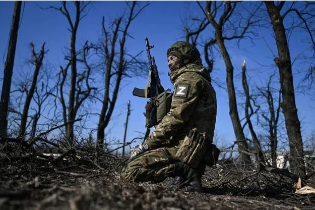 Lính Nga tuần tra ở Ukraine (Ảnh: Sputnik).