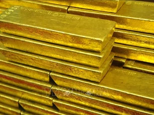 Giá vàng thế giới vẫn tăng bất chấp việc đồng USD mạnh lên