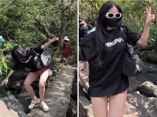 CLIP: Mải mê tạo dáng chụp ảnh, cô gái nhận ngay 'trái đắng'