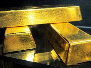 Đà tăng cao kỷ lục của vàng thế giới bị chặn vì... đồng USD