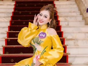 Quán quân dòng nhạc nhẹ "Giọng hát hay Hà Nội 2024" diện thiết kế áo dài tinh xảo của NTK Bùi Thanh Hương