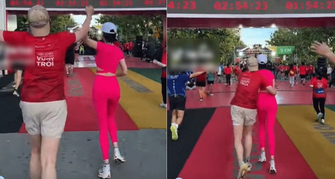 Netizen ngỡ ngàng khi thấy clip một chàng trai nắm chặt tay và ôm eo Ngọc Trinh tại giải chạy 21km