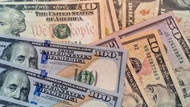 Đồng USD neo gần mức cao nhất trong ba tuần, Bitcoin dao động trên 120.000 USD