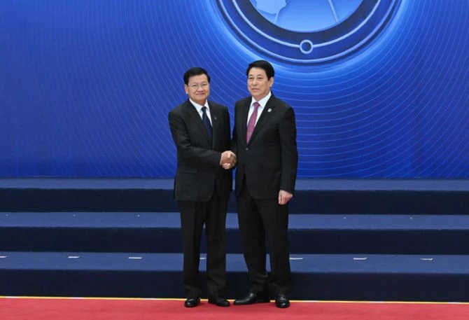 Chủ tịch nước Lương Cường đón Tổng Bí thư, Chủ tịch nước Lào Thongloun Sisoulith dự buổi lễ. Chủ tịch nước Lương Cường đón Tổng Bí thư, Chủ tịch nước Lào Thongloun Sisoulith dự buổi lễ.