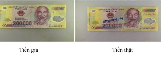 So sánh giữa tờ tiền thật và giả. Ảnh: Công an tỉnh Cao Bằng.