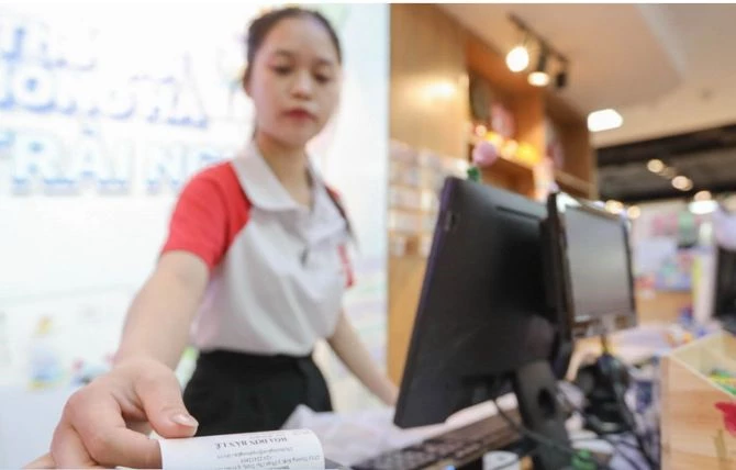 Dự thảo của Bộ Tài chính có một số quy định mới về hóa đơn điện tử khi bán hàng, cung cấp dịch vụ. Ảnh: TTXVN.