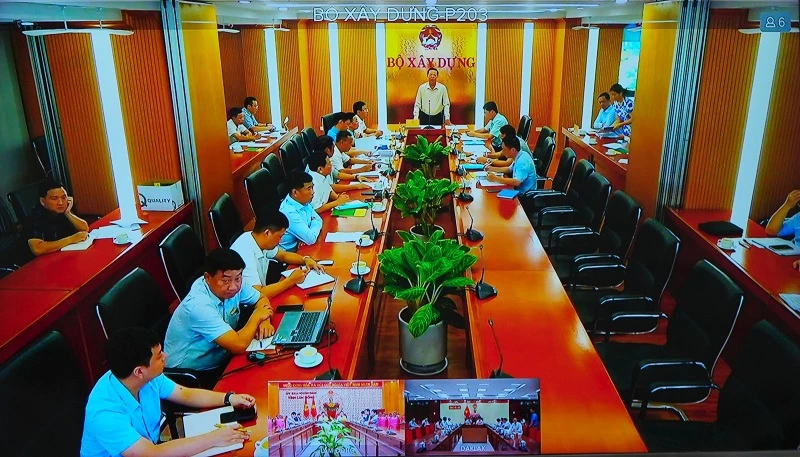 Bộ trưởng Bộ Xây dựng Trần Hồng Minh chủ trì cuộc họp.