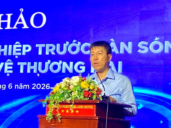 Ảnh 1- Ông Chu Thắng Trung - Phó Cục trưởng Cục Phòng vệ thương mại - Bộ Công Thương phát biểu khai mạc hội thảo.