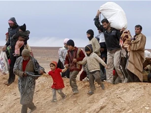 Mỹ không kích Raqqa, người dân Syria hoảng loạn kéo nhau bỏ trốn