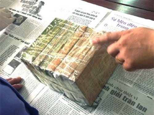 Bắt Chủ tịch Hội nông dân xã vận chuyển 8 bánh heroin