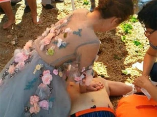 Nữ y tá cứu người chết đuối ngay trong ngày chụp ảnh cưới