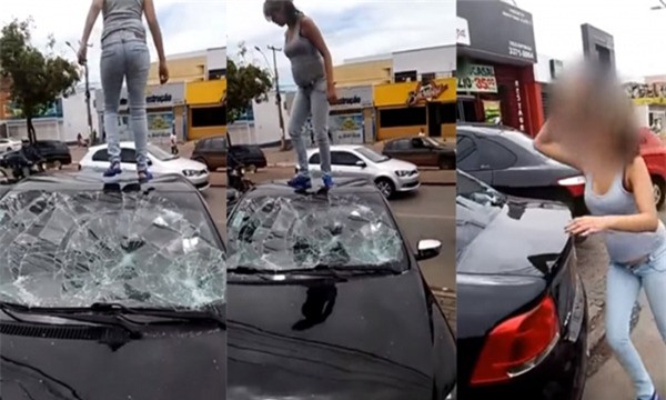 Thai phụ gào thét, nhảy lên xe ô tô đập phá vì chồng ngoại tình