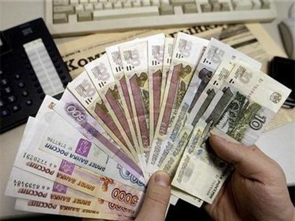 Nga: Đồng ruble mất giá, người vay ngoại tệ "lỗ" nặng