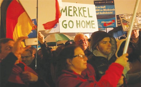 Giải quyết khủng hoảng di cư: Gánh nặng đè lên vai 'bà mẹ' Merkel