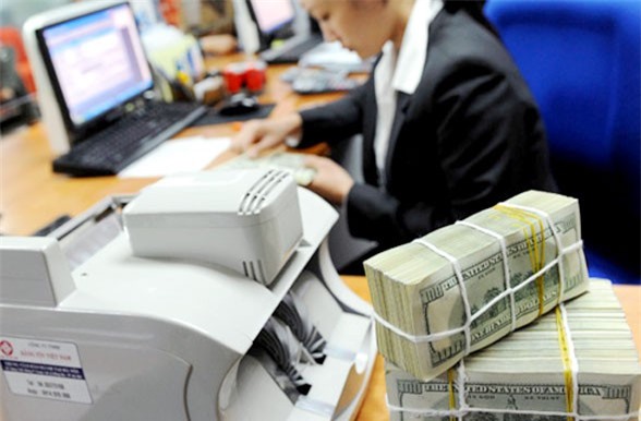 Tái cơ cấu toàn diện tổ chức tín dụng, đẩy mạnh xử lý nợ xấu