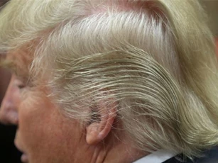 Tiết lộ về kiểu tóc "thảm họa" của Donald Trump