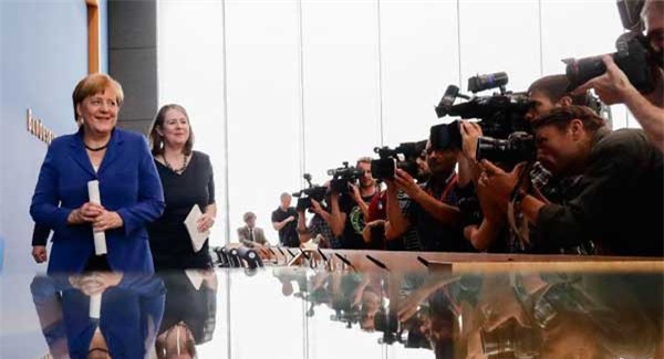 Bà Merkel vẫn cam kết mở cửa đón người tị nạn