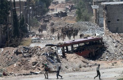 Syria tuyên bố phiến quân đã hạ vũ khí đầu hàng ở Aleppo