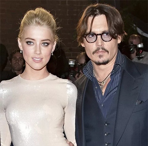 Johnny Depp ly hôn, bồi thường 5 triệu USD cho Amber Heard