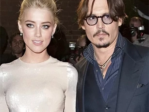 Johnny Depp ly hôn, bồi thường 5 triệu USD cho Amber Heard