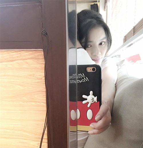 Lý Nhã Kỳ úp mở khoe bạn trai 7 năm 