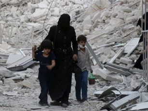 Aleppo của Syria lại bị không kích và tấn công bằng bom thùng