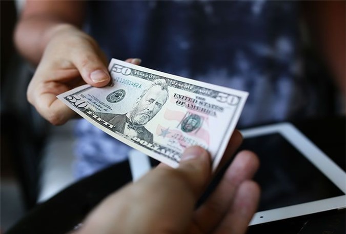 Nghiêm cấm trả lại ngoại tệ giả, ngoại tệ nghi giả cho khách hàng