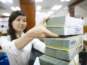 Thống đốc yêu cầu ngân hàng đẩy mạnh tái cơ cấu, xử lý nợ xấu