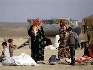 Vì sao IS bắt nam giới Raqqa, Syria mặc "áo dài Afghanistan"?
