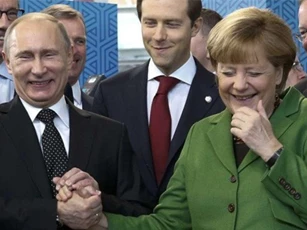 Putin mong ngóng Merkel tới thăm Nga