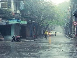 Hà Nội có mưa phùn, trời nồm ẩm đến hết tuần