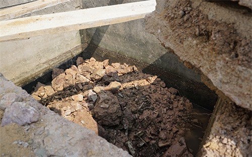 Tin mới vụ phát hiện hài cốt nữ giới trong bể phốt ở Thanh Hóa