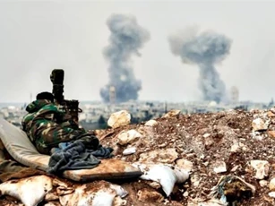 Pháo binh quân đội Syria "càn quét" các tay súng IS ở thành Homs