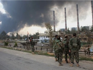 Quân đội Syria "đuổi cổ" IS, tiến gần mỏ dầu chiến lược ở Palmyra