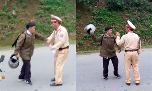 Người đàn ông đoạt gậy điều khiển, đòi đánh cảnh sát giao thông